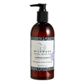 Bottle of Wildwash Whitening Shampoo on a white background